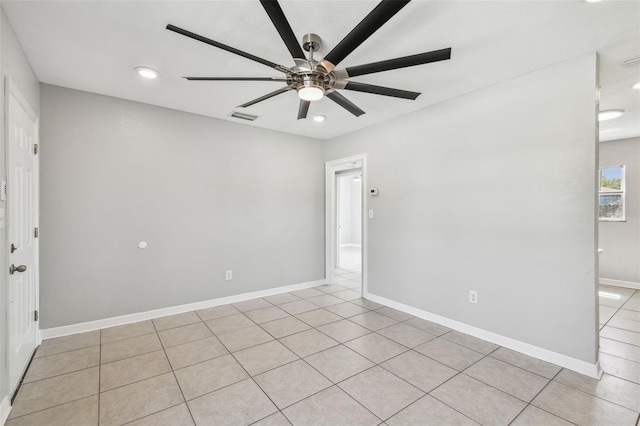 unfurnished room with a ceiling fan, recessed lighting, visible vents, and baseboards