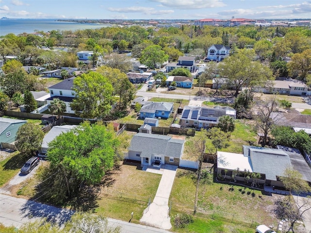 bird's eye view with a water view and a residential view