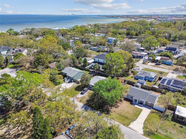 birds eye view of property with a residential view and a water view