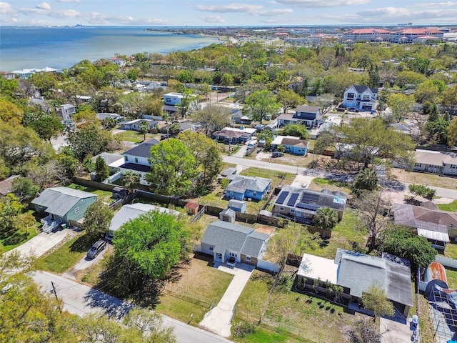 drone / aerial view featuring a water view and a residential view