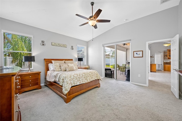 bedroom with ceiling fan, carpet flooring, baseboards, vaulted ceiling, and access to outside