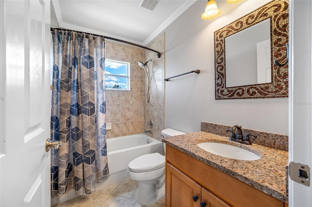 bathroom with toilet, vanity, visible vents, tile patterned floors, and crown molding