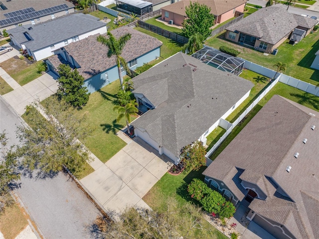 birds eye view of property with a residential view