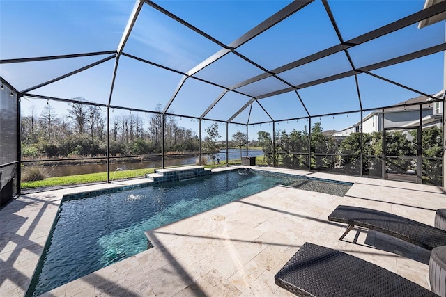 pool with a water view, a patio area, and a lanai