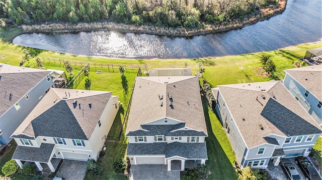 birds eye view of property featuring a water view