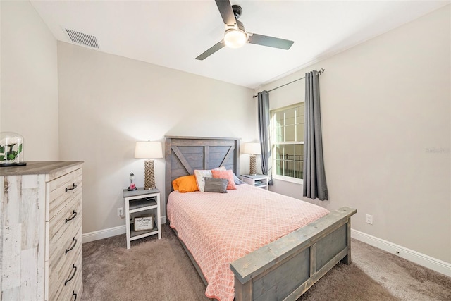 bedroom featuring carpet flooring, visible vents, and baseboards