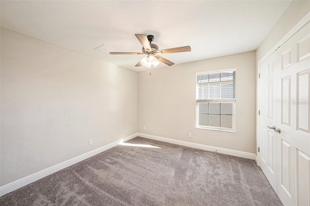 unfurnished room featuring carpet, baseboards, and ceiling fan