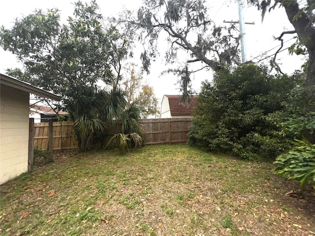 view of yard with fence