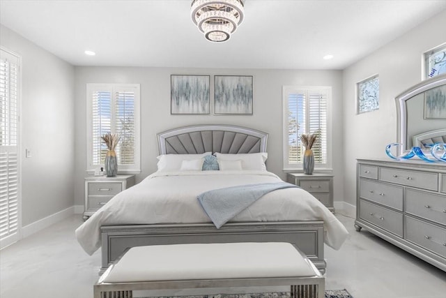 bedroom with light carpet, recessed lighting, and baseboards