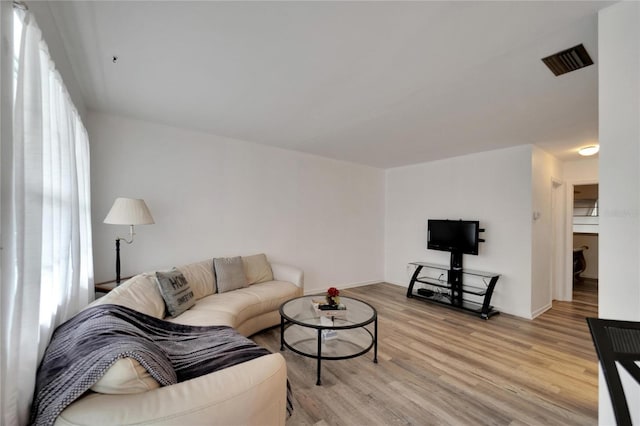 living area with light wood finished floors