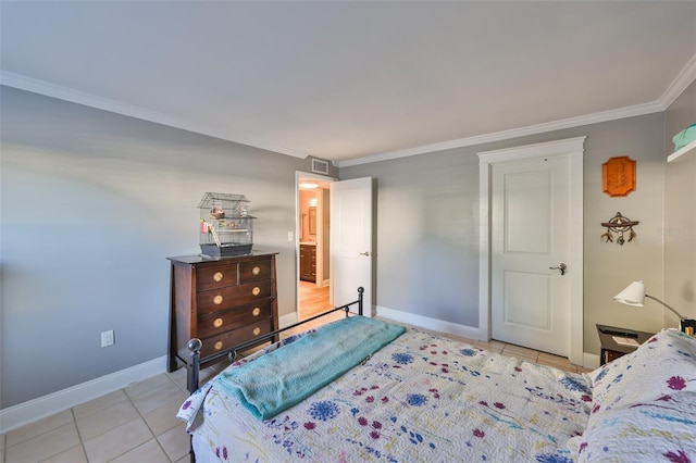 bedroom with tile patterned flooring, visible vents, baseboards, and ornamental molding