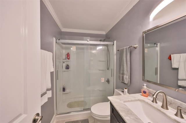 full bathroom featuring toilet, a shower stall, ornamental molding, and vanity