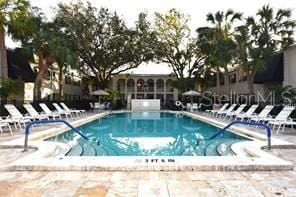 view of swimming pool featuring a patio