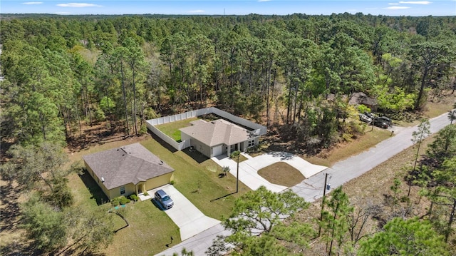 aerial view with a wooded view