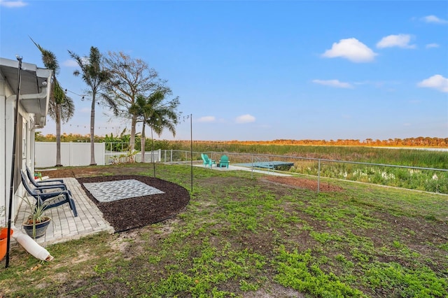 view of yard featuring a patio area and fence