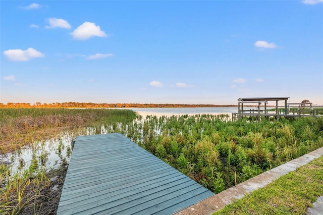 view of dock with a water view