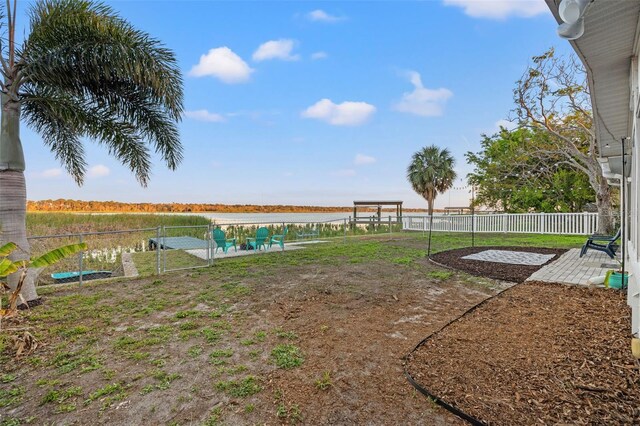 view of yard featuring a patio area and fence