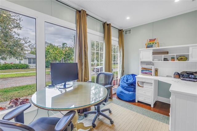 office space with visible vents, wood finished floors, and recessed lighting