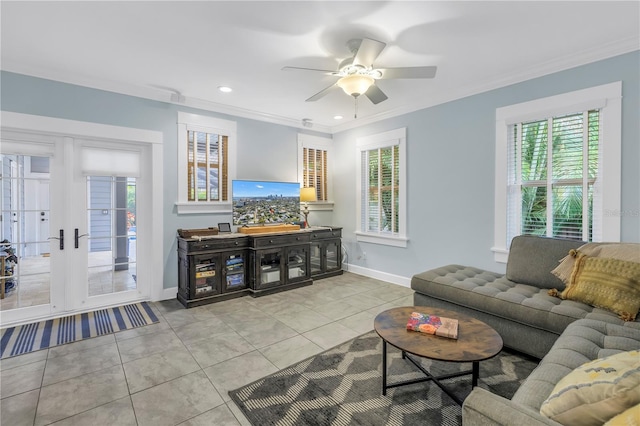 living area featuring light tile patterned floors, ceiling fan, recessed lighting, baseboards, and ornamental molding