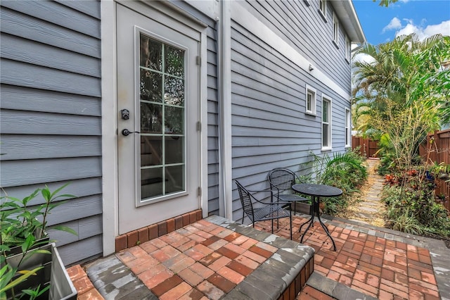 view of patio / terrace featuring fence