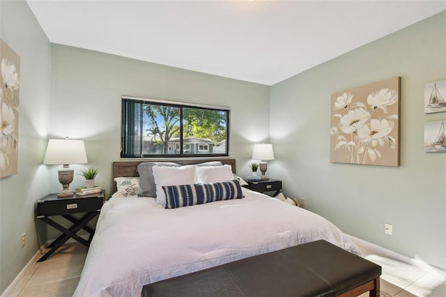 tiled bedroom with baseboards