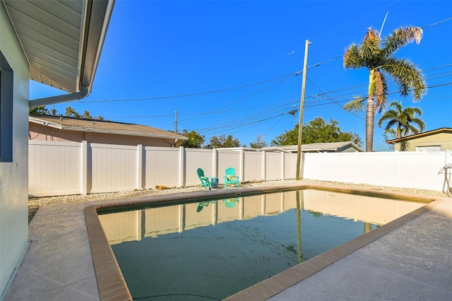 view of pool with a fenced in pool and a fenced backyard