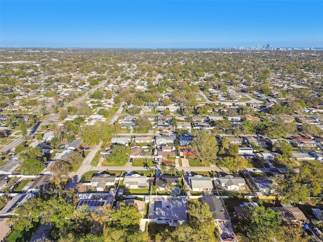 birds eye view of property with a residential view