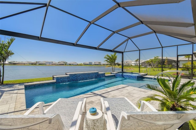 view of swimming pool featuring a patio, a lanai, and a pool with connected hot tub