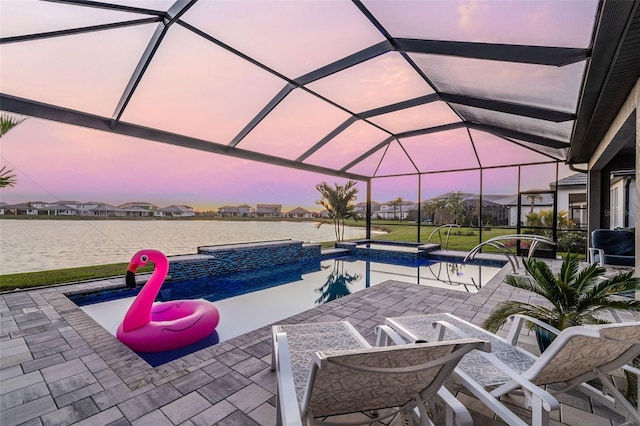 view of patio with glass enclosure, an outdoor pool, and a hot tub