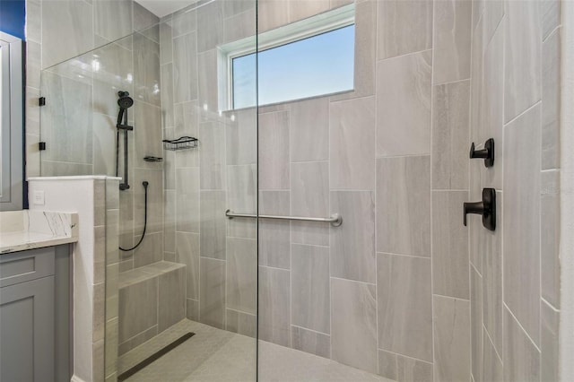 full bath with vanity and walk in shower