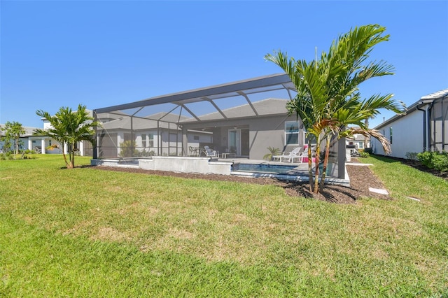 rear view of property with stucco siding, a lawn, a patio, glass enclosure, and an outdoor pool