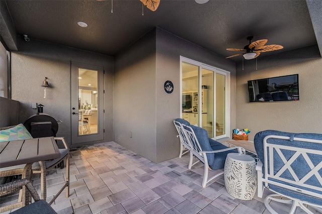 view of patio / terrace with ceiling fan