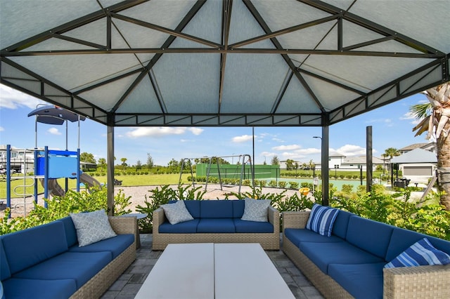 view of patio / terrace with outdoor lounge area, a gazebo, and a playground