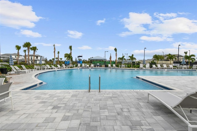 community pool with a patio