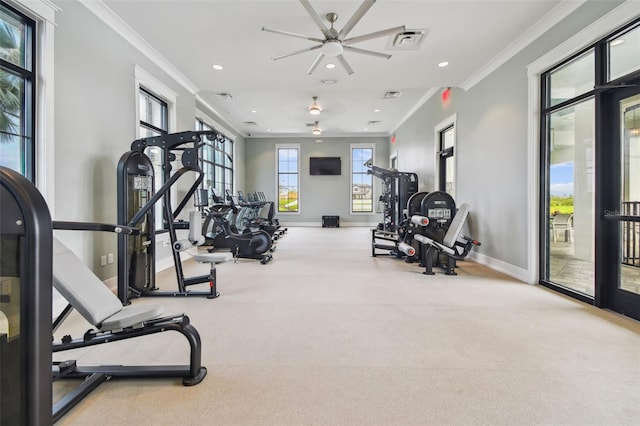 exercise room with recessed lighting, baseboards, visible vents, and ornamental molding