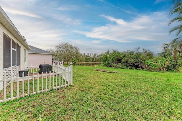 view of yard featuring fence