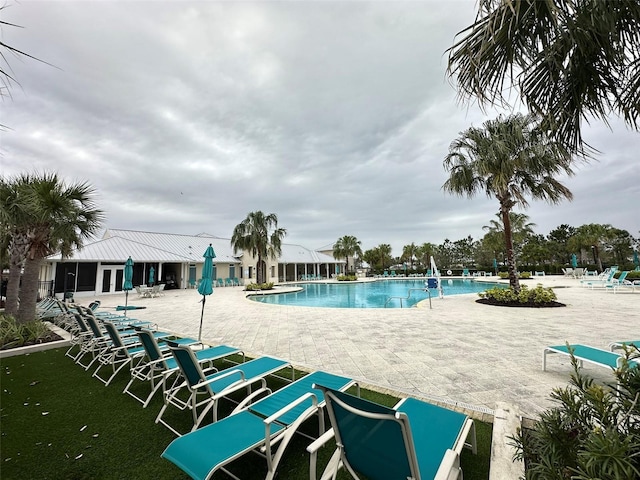 community pool featuring a patio