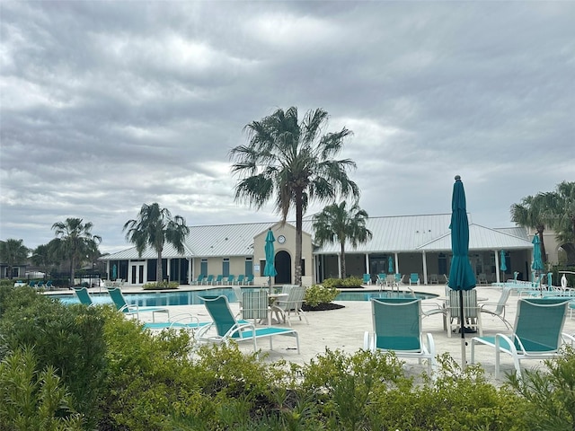 pool featuring a patio area