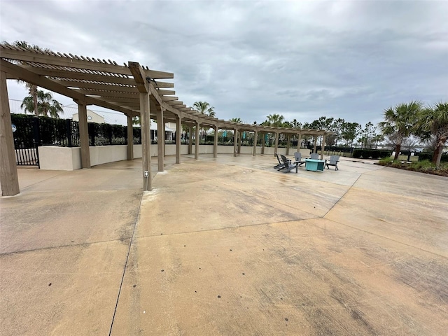 exterior space featuring a patio, fence, and a pergola