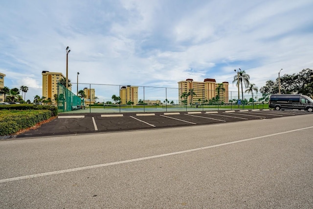 uncovered parking lot with fence