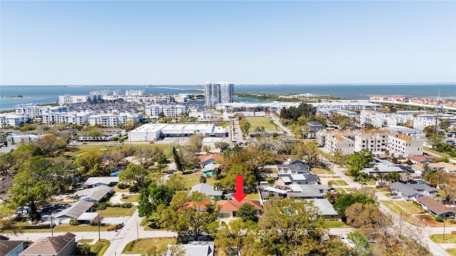 drone / aerial view featuring a water view and a city view