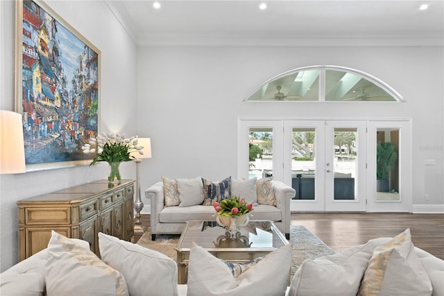 living room with french doors, recessed lighting, ornamental molding, ceiling fan, and wood finished floors