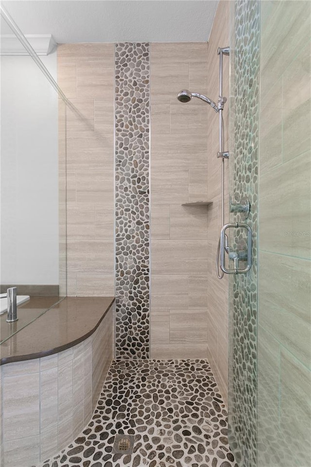 full bathroom featuring a stall shower