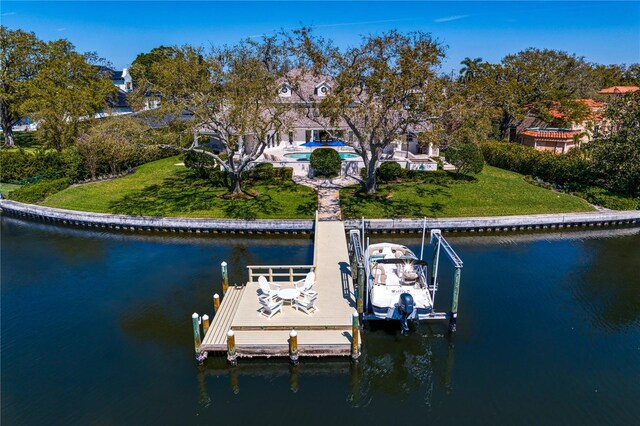 view of dock with a water view, an outdoor pool, and boat lift