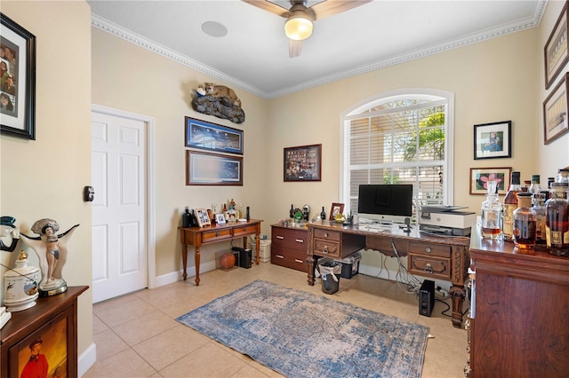 office area with ceiling fan, baseboards, light tile patterned flooring, and ornamental molding