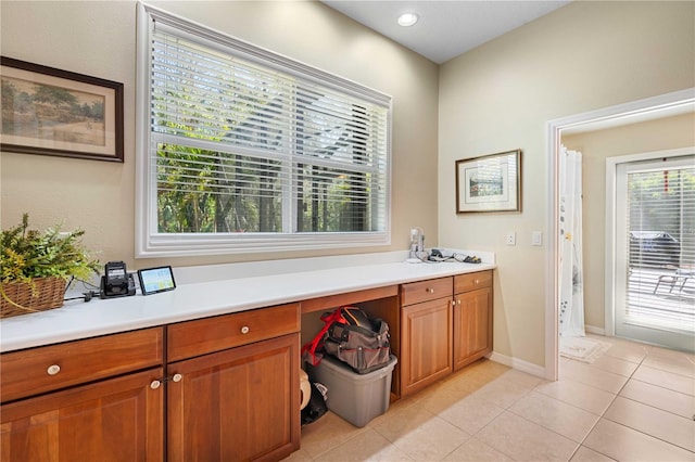 interior space with tile patterned flooring, recessed lighting, a shower with shower curtain, and baseboards