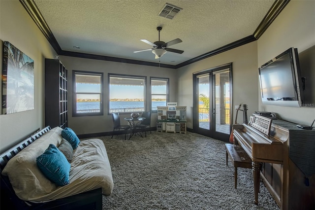 living area featuring crown molding, french doors, visible vents, and carpet floors