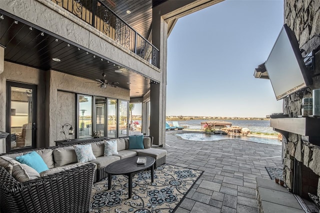 view of patio with a balcony and an outdoor hangout area