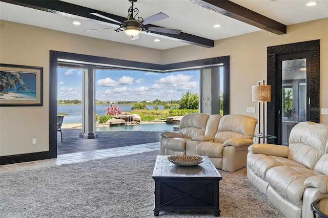 living room featuring beamed ceiling, a wealth of natural light, ceiling fan, and recessed lighting