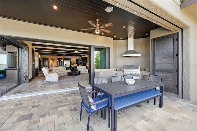 view of patio / terrace featuring outdoor dining area, a grill, ceiling fan, and area for grilling